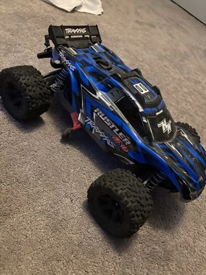 Camión de estadio Traxxas Rustler 4x4 VXL cepillado azul Foto 1 de 4