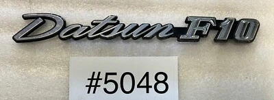1976 1977 1978 Datsun F10 Body Fender Emblem Badge Plastic Good Posts #5048 - Image 1 of 4