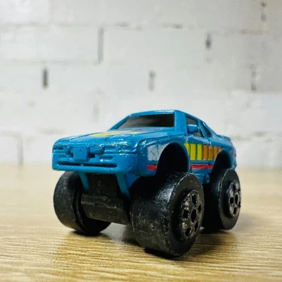 Micro Machines Galoob Porsche 944 Lifted 4x4 Blue Yellow Orange - Image 1 of 4