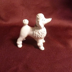 Vintage - bemalter Porzellanpudel - hellrosa mit Goldakzenten & blauen Augen - EVC - Bild 1 von 5