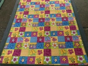 Teppich Kinderteppich Blumen Patchwork Schmetterling 133 x 180 cm bunt - Bild 1 von 4