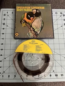 OPERATION LOVE BIRDS GEBOGENER STOFF MUSIK STEREO TONBANDSPULE SIEHE BILD - Bild 1 von 1
