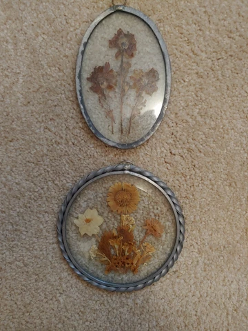 Lot of 2 Pewter Framed Dried Flowers Under Glass Wall Decor. 1 round, 1 oval Cover