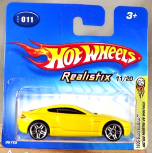 2005 Hot Wheels #11 1st Editions 11/20 ASTON MARTIN V8 VANTAGE Yellow Short Card - Picture 1 of 5