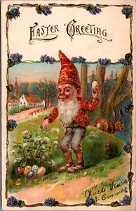 Hermosa postal alemana de Pascua en relieve gnomo elfo 1907 oro dorado recorte - Imagen 1 de 2
