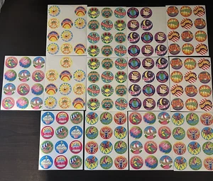 Lote de 13 hojas de pegatinas vintage circulares rasca y olfatea - ALGUNAS INCOMPLETAS - Imagen 1 de 5