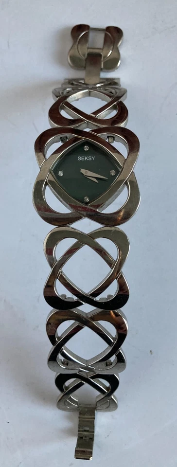 Vintage • Seksy • Ladies 7" Quartz Watch w/Silver Tone Bracelet & Green Face - Image 1 of 1