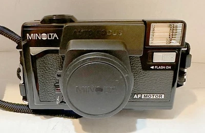 Minolta Hi-Matic AF2 35mm Film Camera - Vintage Point & Shoot Cover, Stap & Case - Image 1 of 4