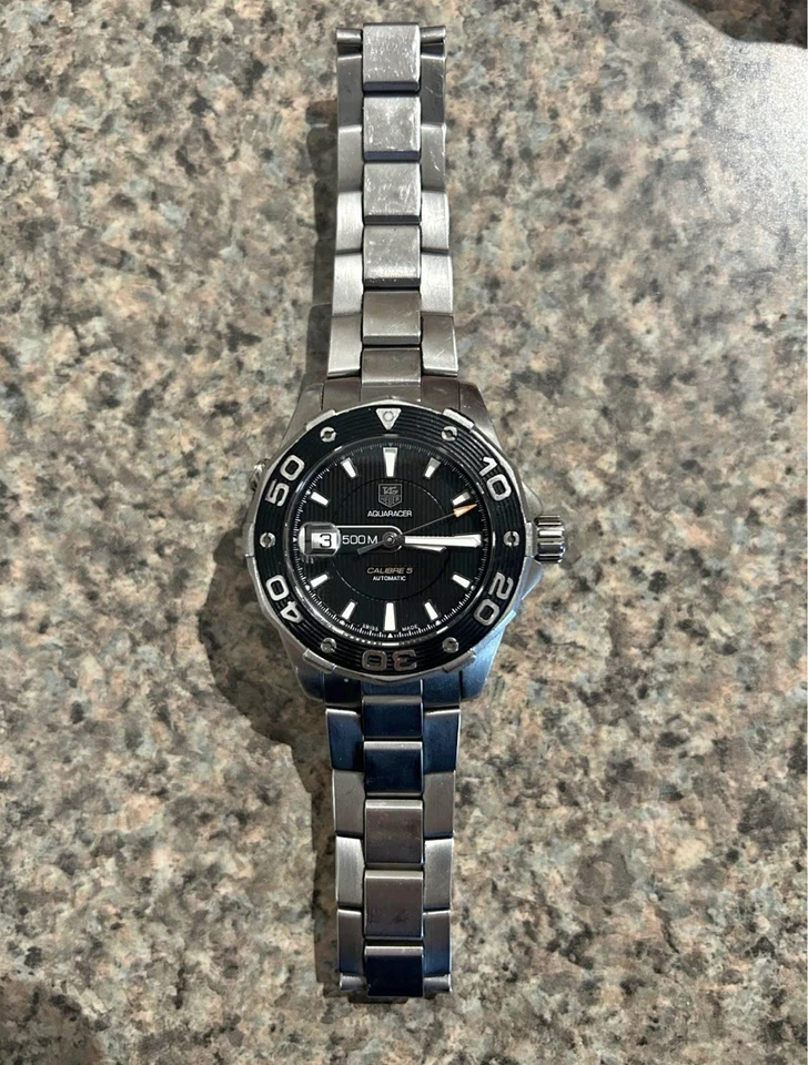 Reloj Hombre Tag Heuer Aquaracer Calibre 5 WAJ2110 500M Acero Inoxidable Foto 1 de 4