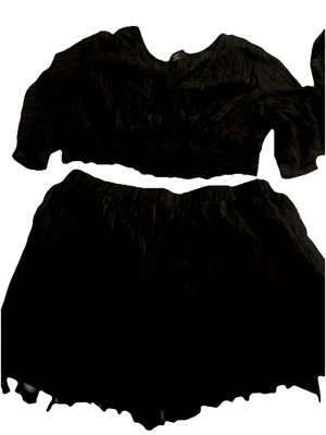 Tiro negro de dos piezas Foto 1 de 3