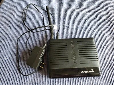 Qwest Actiontec PK5000 Wireless DSL Modem includes power plug and CAT 5 cable - Image 1 of 3
