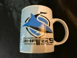 TAZA/TAZA: CRONULLA SHARKS NRL NRLW SUPPORTER SHARKIES TAZA OFICIAL 2004 - Imagen 1 de 5