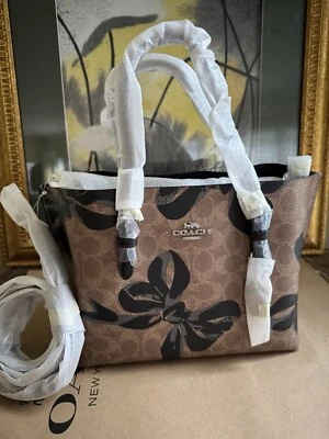 NWT Coach Mollie Tote Bag 25 In Signature Canvas With Bow Print Tan Black Multi - Image 1 of 4