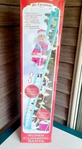 Mr. Christmas Super Climbing Babbo Natale 43" Scala Luci Movimento e Musica Rosa Blu - Foto 1 di 11