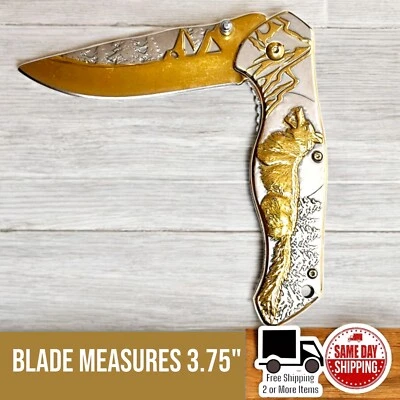 Navaja de Bolsillo Plegable Asistida Hoja de Acero Tono Dorado Wilderness Wolf Hoja de 3.75"  Foto 1 de 3