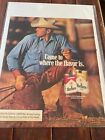 1986 Marlboro Cigarettes Cowboy With Branding Iron Ad