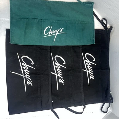 Chuy’s Tex-Mex aprons three black one green - Image 1 of 2