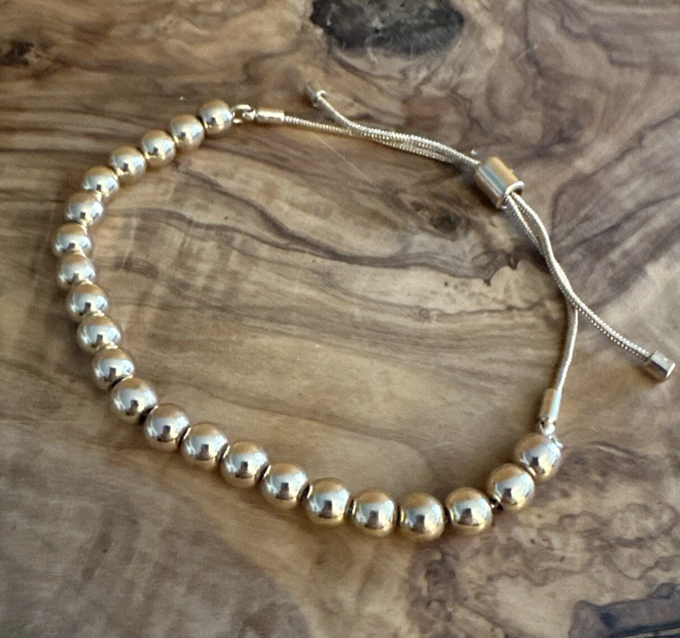 Pulseira J Crew 6mm tom dourado com miçangas bola deslizante ajustável - Imagem 1 de 4