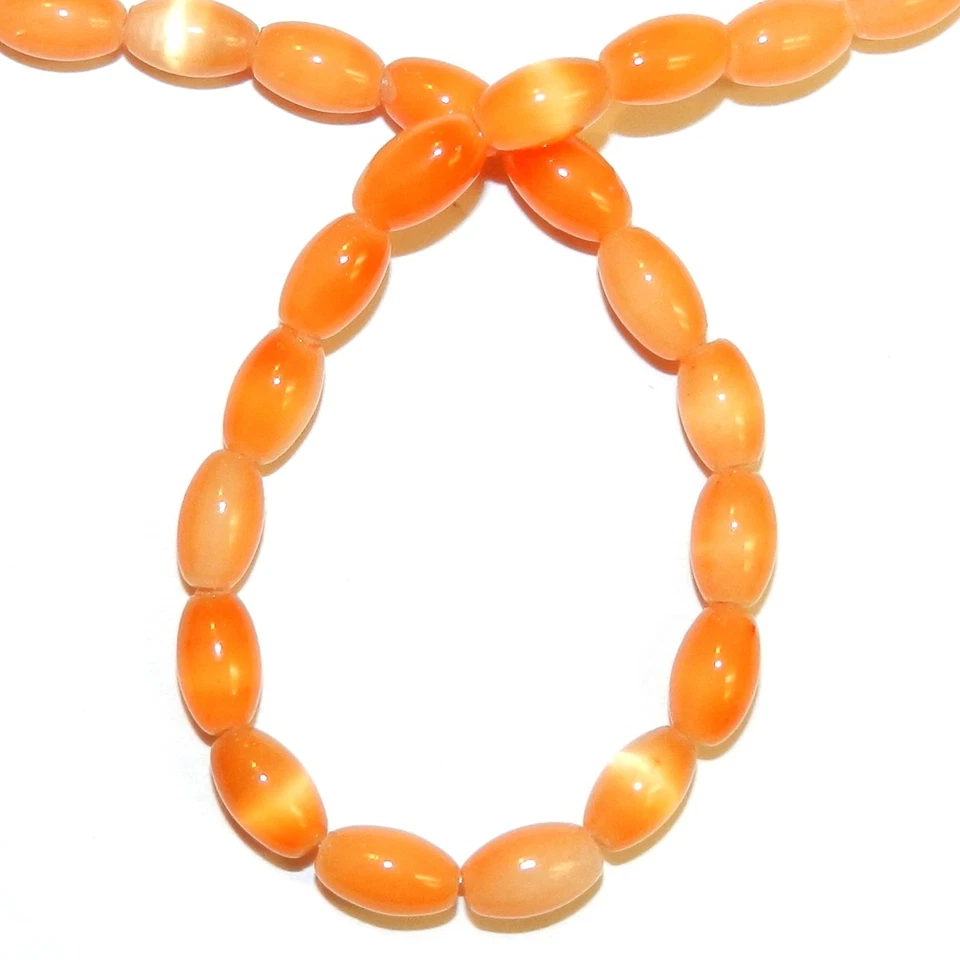 G457 Naranja 7mm Cónico Ovalado Ojo de Gato Fibra Óptica Cuentas Vidrio 16"  Foto 1 de 1