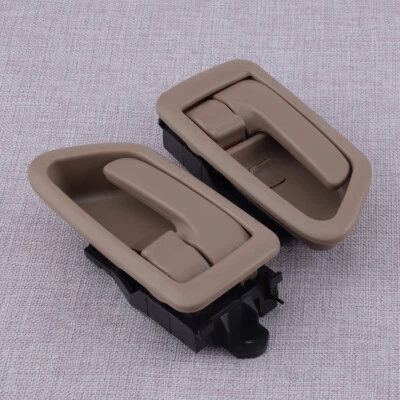 Par de molduras de panel de tracción de manija de puerta interior beige aptas para Toyota Camry 1997-2001 Foto 1 de 4