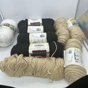 Lote de 9 madejas de hilo Bernat & Caronte negro, hueso y blanco - Imagen 1 de 5
