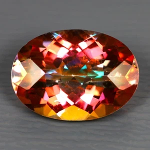 6,77 ct außergewöhnlicher ovaler (14,02 x 10,07 mm) mehrfarbiger Dämmerungstopas original - Bild 1 von 3