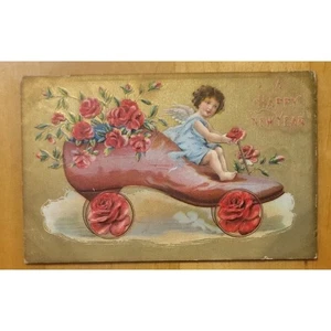 "Feliz Año Nuevo" - Zapato Rojo Conducción Ángel - Tarjeta Postal Repujada 1907-1915 - Imagen 1 de 2