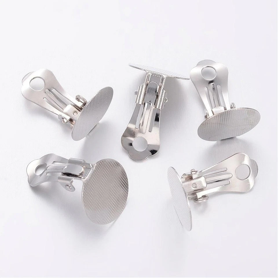 2coppie ganci per orecchini  a clip con base patta colore platino 15mm diametro - Immagine 1 di 1