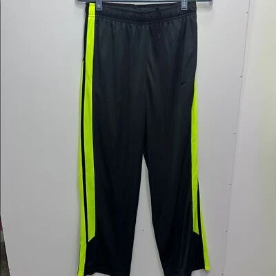 Pantalones negros Nike con detalles en amarillo neón. ZS XL Foto 1 de 4