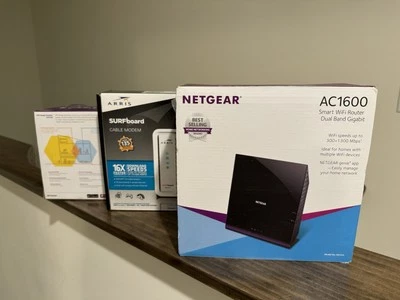 Router, Modem, Extender Bundle. Arris. Netgear - Image 1 of 4