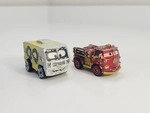 Disney Pixar Cars Mini Racers Rustez Fire Truck & Arvy Camper - Picture 1 of 14