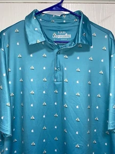 Polo de golf LRD para hombre L azul rendimiento elástico AOP botes y azadas geométricas - Imagen 1 de 5