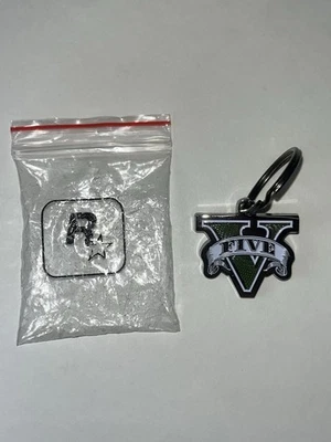 Grand Theft Auto GTA V 5 Logo Metal PROMOCIÓN Original Rockstar Games Llavero  Foto 1 de 2