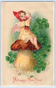 1908 HAPPY NEW YEAR ANGEL CHERUB SITTING MUSHROOM CHAMPAGNE EMBOSSED POSTCARD - Bild 1 von 2