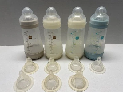 Four 9oz MAM Anti-colic Infant Baby Bottle With 11 Varying Nipple Sizes & Caps - Image 1 of 2