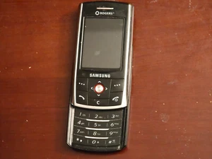 Samsung SGH-D807 old, retro, vintage, mobile, slider phone (2006) - No battery - Photo 1 sur 14