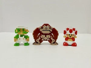 World of Nintendo Jakks 2.25" 8-Bit NES Super Mario Toad Luigi Donkey Kong 2015 - Imagen 1 de 8