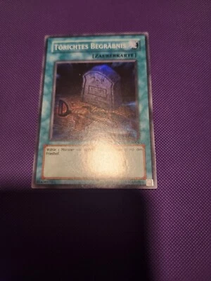 Yugioh Foolish Burial TU02-EN004 Super Rare German LP Light Play - Image 1 of 2