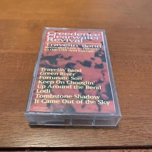 Creedence Clearwater Revival - Travelin' Band Live In Concert Cassette Tape 1990 - Picture 1 of 5