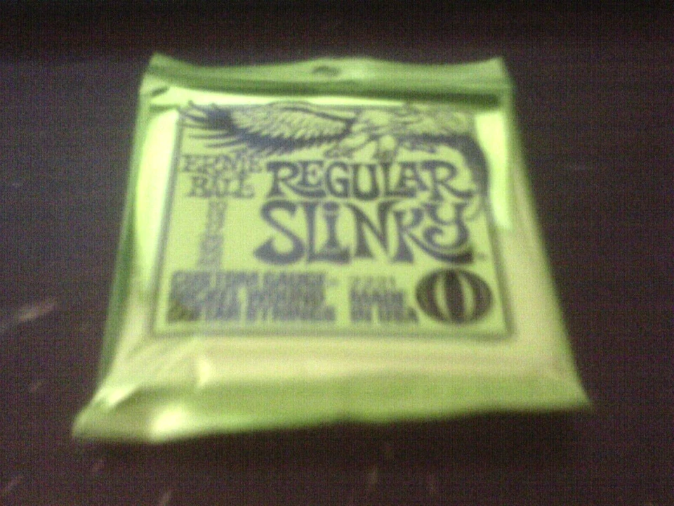 Никелевые намотанные гитарные струны Ernie Ball Regular Slinky 2221 Reg. 10-46 - Изображение 1 из 1