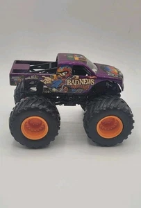 HOT WHEELS MONSTER JAM TRUCK BAD NEWS TRAVELS FAST PURPLE 1:64 SCALE DIECAST CAR - Picture 1 of 8