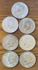 1964 50C Kennedy Half Dollars. Lot Of (7). 90% Silver