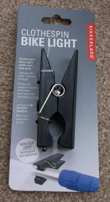 Kikkerland Black Clothespin Clothes Peg LED Bike Light Clip On Bicycle Handlebar - Image 1 of 3
