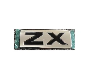 "ZX" Name Plate 75473-60220 Land Cruiser Rear Body Name #3. GENUINE TOYOTA PART - Picture 1 of 2