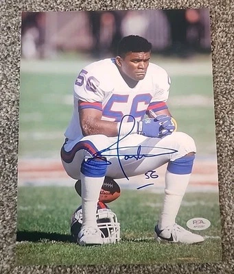LAWRENCE TAYLOR SIGNED 8X10 PHOTO NEW YORK GIANTS HOF PSA/DNA AUTHENTIC #AP33207 - Image 1 of 2