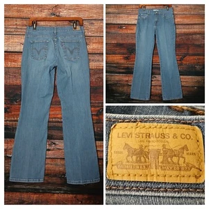 Levis Jeans Size 6 515 Boot Cut Mid Rise Medium Steel Blue Denim Stretch - Picture 1 of 11