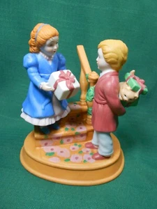 Avon Christmas Memories Figurine 4th Edition Celebrating the Joy of Giving - Picture 1 of 6