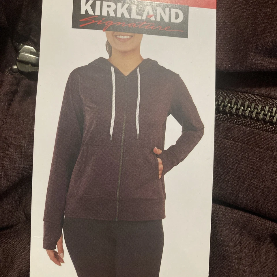 Chaqueta Kirkland Signature para damas ligera con cremallera completa borgoña agujeros medianos para los pulgares Foto 1 de 1