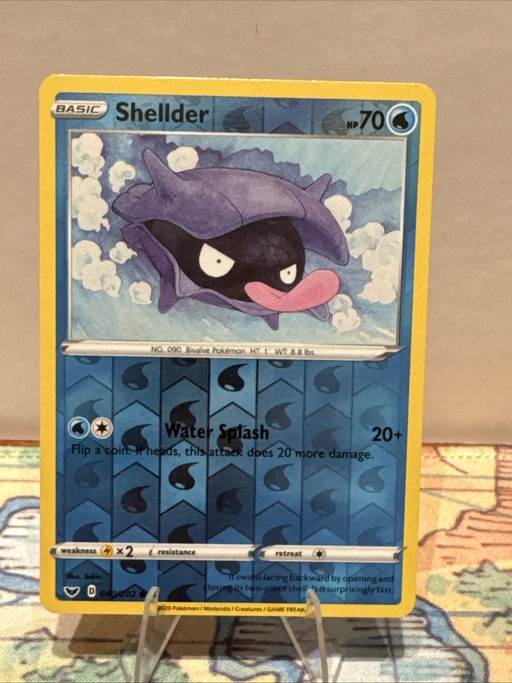 Shellder 040/202 Swsh01: Sword & Shield Reverse Holo - Image 1 of 2