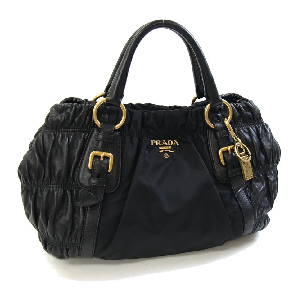 Bolso de mano Prada BN1791 de segunda mano en cuero negro y nylon con logo fruncido Foto 1 de 4